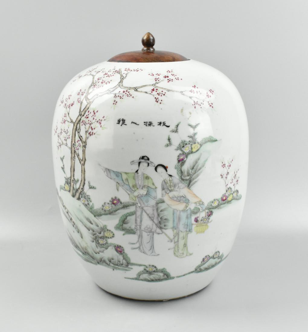 Chinese Famille Rose Covered Jar w/ Figure, ROC P.: A Chinese famille rose covered jar with figures, dating from the Republic period. A rounded jar with wooden cover and small cone shaped finial. The design features two elegant ladies in nature, one ho