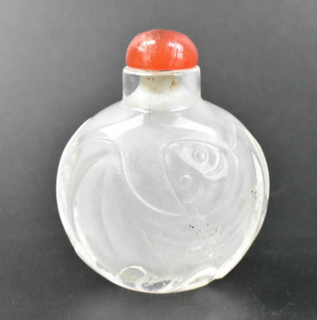 Chinese Glass Carved Snuff Bottle w/ Bats,Qing D.: A Chinese Peking glass carved snuff bottle with bats.dated to Late Qing Dynasty A large bad carved in relief on either side, with a coral red stopper. H. 2 1/2" (6.3 cm) Condition: good condition with