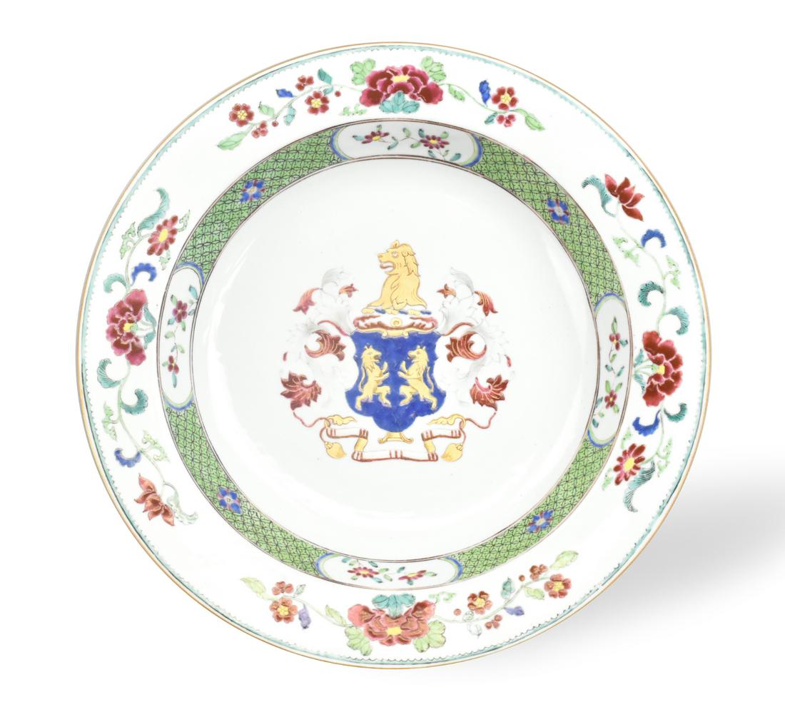 Large Chinese Export Armorial Plate, 18th C.: A large Chinese export armorial plate, dating from the 18th century. At the center of the deep well is a crest with a lion figure and two standing lions, with tongues out. Red and white flowers frame