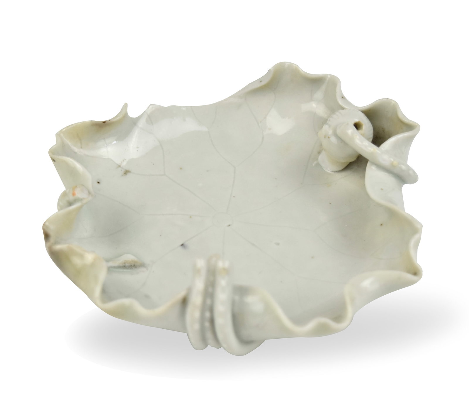 Chinese White-Glazed 'Lotus' Washer, 19th C.: Chinese ,19th C,the flaring sides rising from a short foot ring to a hexagonal foliate rim, encircling a dished circular section with raised rim, covered overall in an ivory-white glaze, with stems an