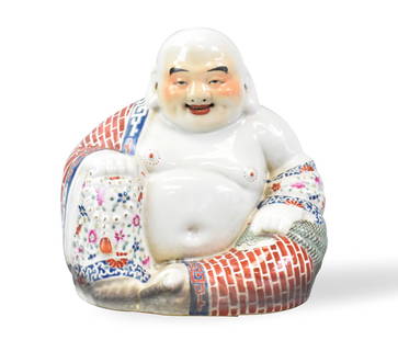Chinese Famille Rose Buddha Figure, ROC Period: A Chinese famille rose Buddha figure, dating from the Republic period. The plump and wide Buddha sits smiling with his robe draped open and his right knee up. He clutches prayer beads in his right han