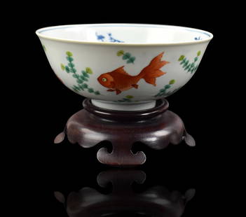 Chinese Famille Rose Fish Bowl, Daoguang Period: Chinese famille rose gold fish bowl ,Daoguang mark and of the period, the rounded sides rising to a flared rim, the exterior painted with four gold fish in iron red and grisaille color swimming amidst