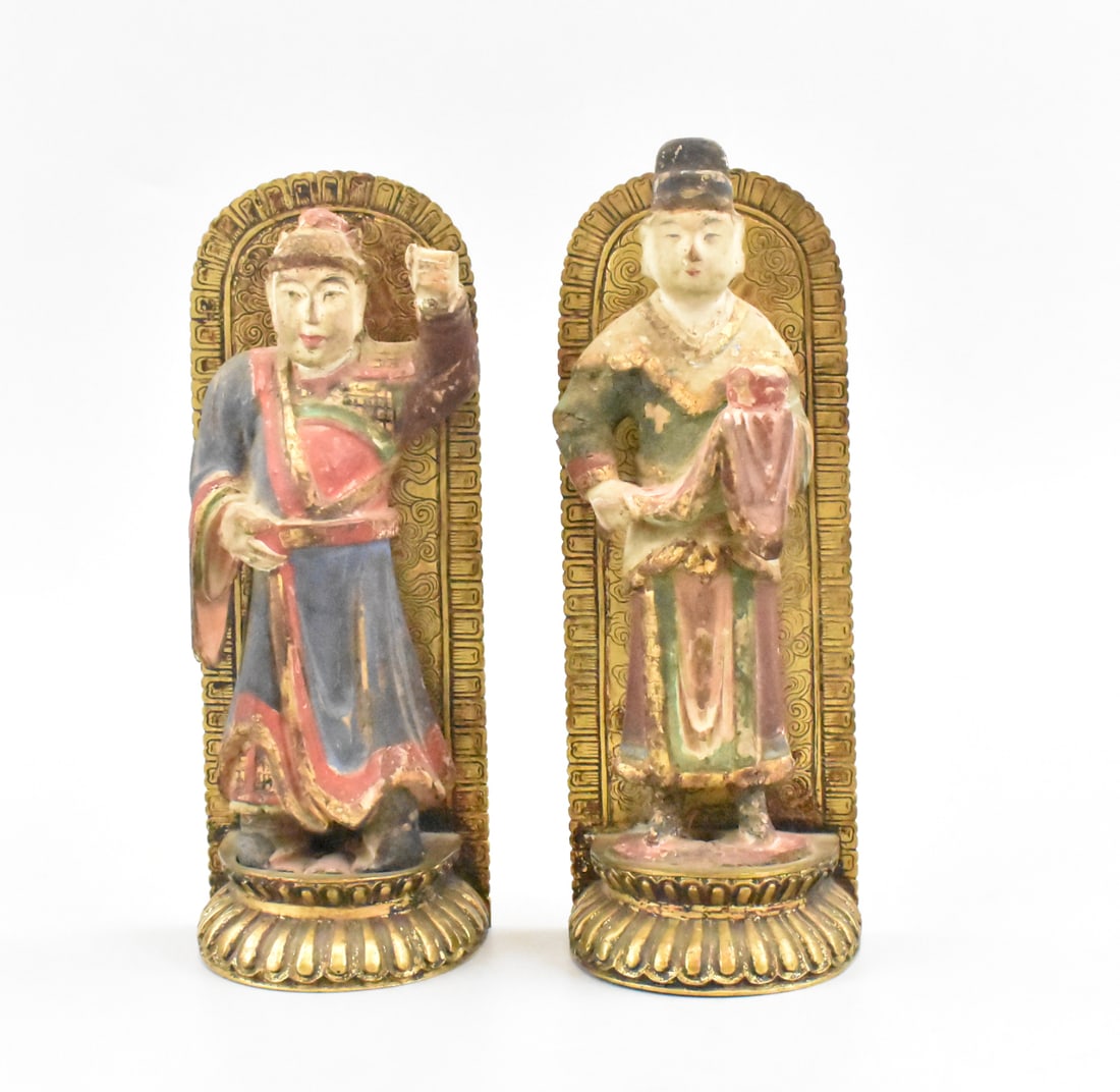 Pair of Chinese Gilt Lacquered Wood Figures,19th C: A pair of Chinese gilt lacquered wood figures, dating from the 19th century. The figures are mounted to gilt bronze stand in L bookend shapes with the base shaped as a lotus platform. The wood figures