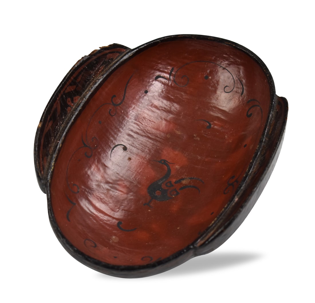 Chinese Lacquered Wood Wine Cup w/ Crane, Han D.: A Chinese lacquered wood wine cup with crane design inside, dating from the Han dynasty (26 BCE - 220 CE). The cup is oval with two carved handles along the long sides. inside has incised crane carvin