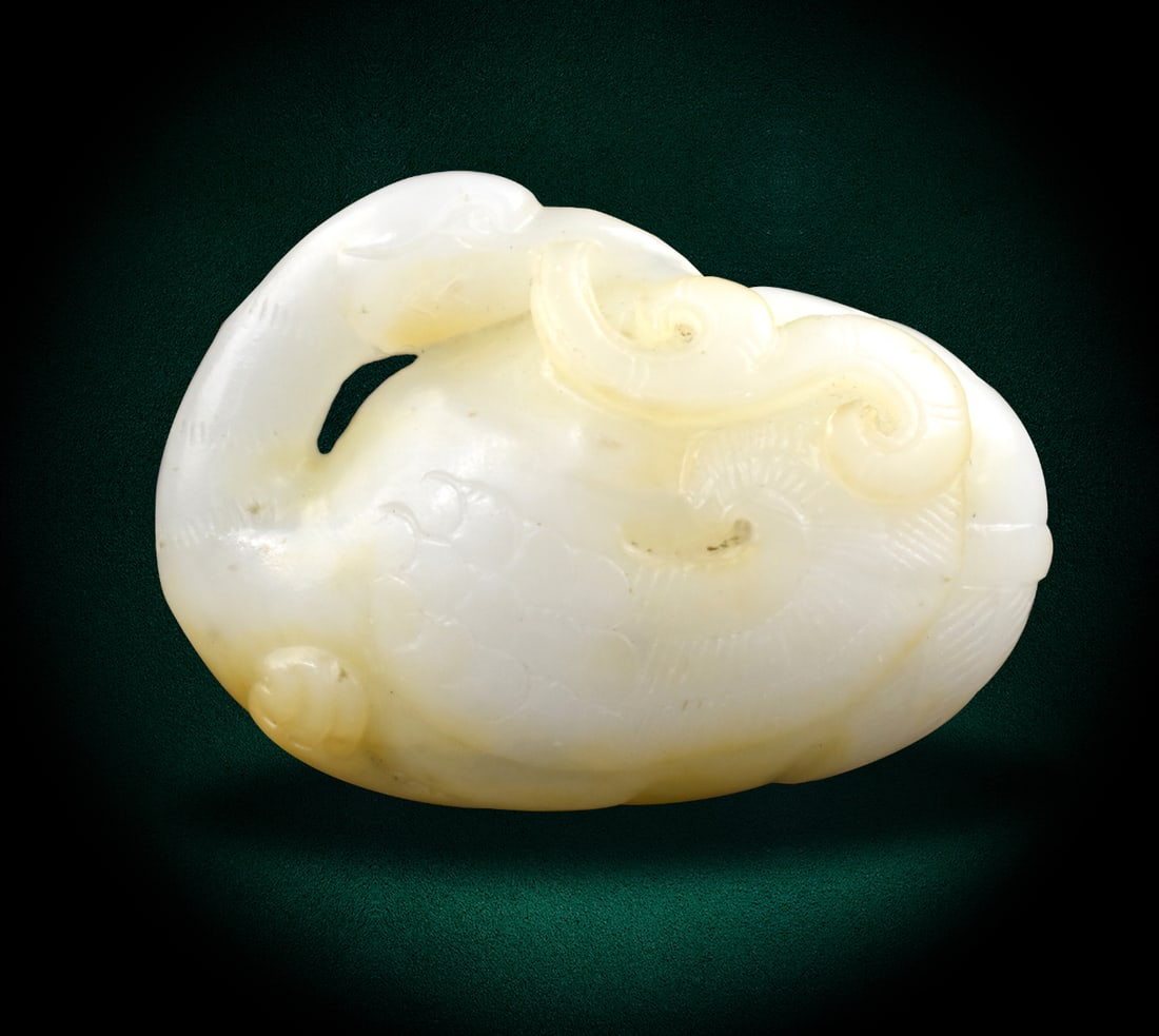 Chinese Jade Carved Swan, Qing Dynasty: Chinese jade carved swan figure, Qing Dynasty , turns its head back holding a lingzhi mushroom in its mouth, Incised work on the wings. L. 1 7/8" (4.7 cm) Link to HD Natural Light photos: