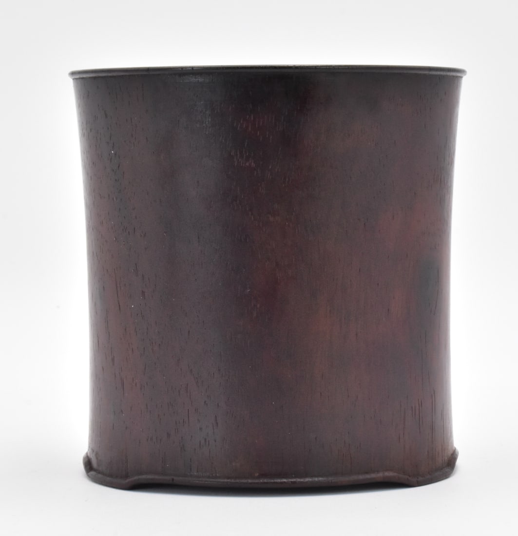 Chinese Huanghuali Carved Brushpot, Qing Dynasty: Chinese Huanghuali carved brushpot, a large cylindrical form brushpot with substantial finely smoothed surface, beautiful grain and thick sides H: 5 3/8"(13.5 cm) D: 5 3/8"(13.5 cm) Collection of a pr