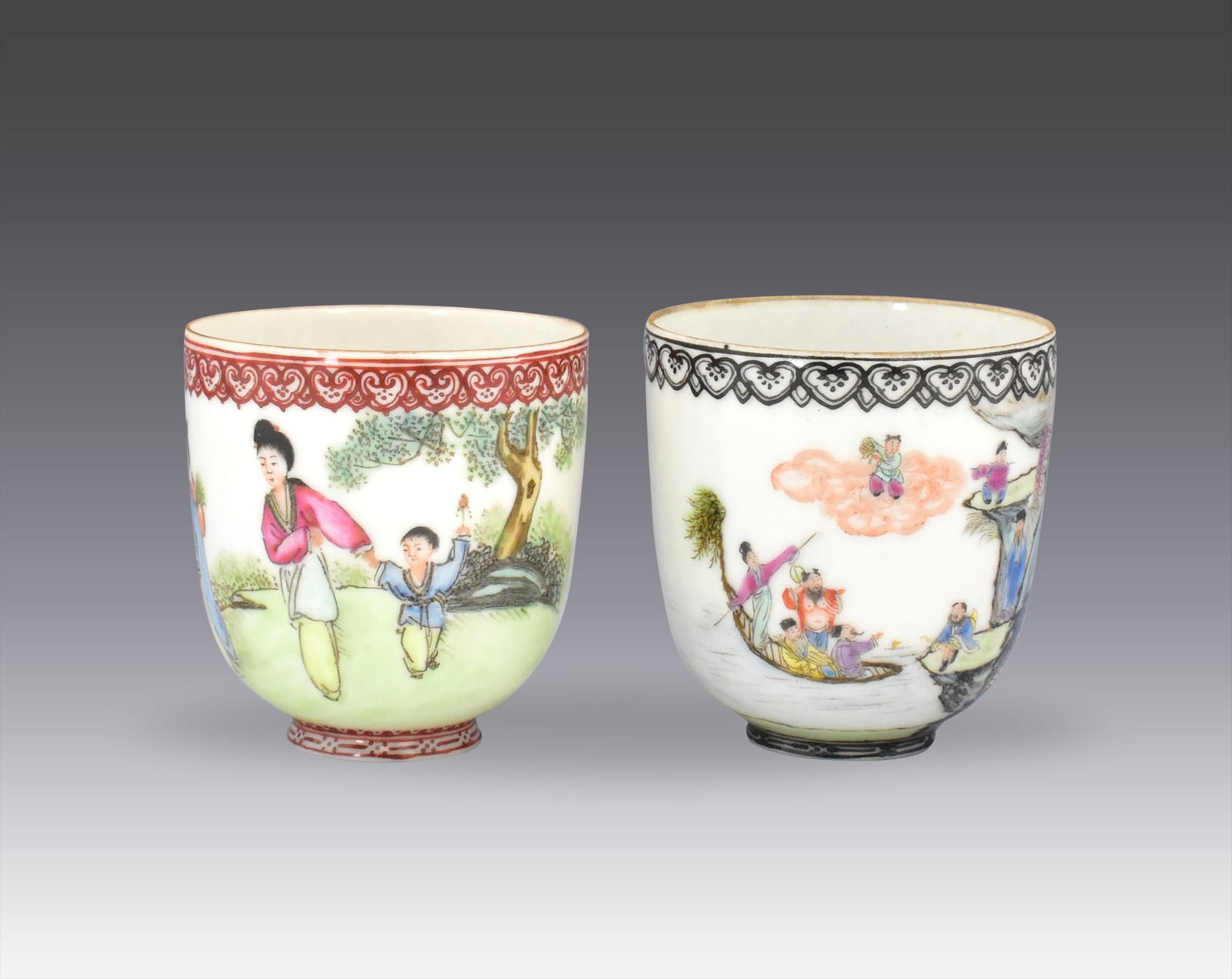 2 Chinese Egg Shell Famille Rose Cup,ROC Period: 2 Chinese egg shell famille rose cups, dating from the Republic period. one cup features 8 immortals in landscape with a red seal mark underside,the other cup painted with two adult with a child walki