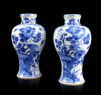Pair of Chinese B & W Meiping Vase, Kangxi Period: A pair of Chinese blue and white Meiping vases, dating from the Kangxi period (1662-1722). Each vase with wide shoulder tapering to short wide straight neck features a Chinese landscape with butterfli
