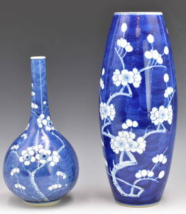 2 Chinese Blue & White Prunus Jar & Vase,19th C.: two Chinese blue and white prunus jar & vase, dating from the 19th century. Both prunus designs, white flowers on branches over blue ground. Jar has wide base and mouth with bowed body, the vase with