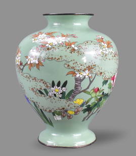 Japanese Cloisonne Vase, Meiji Period: A Japanese cloisonne vase, dating from the Meiji period (1868-1912). Mint green cloisonne vase with curved base, widening body which curved back inwards at a high shoulder to a very short neck and sli