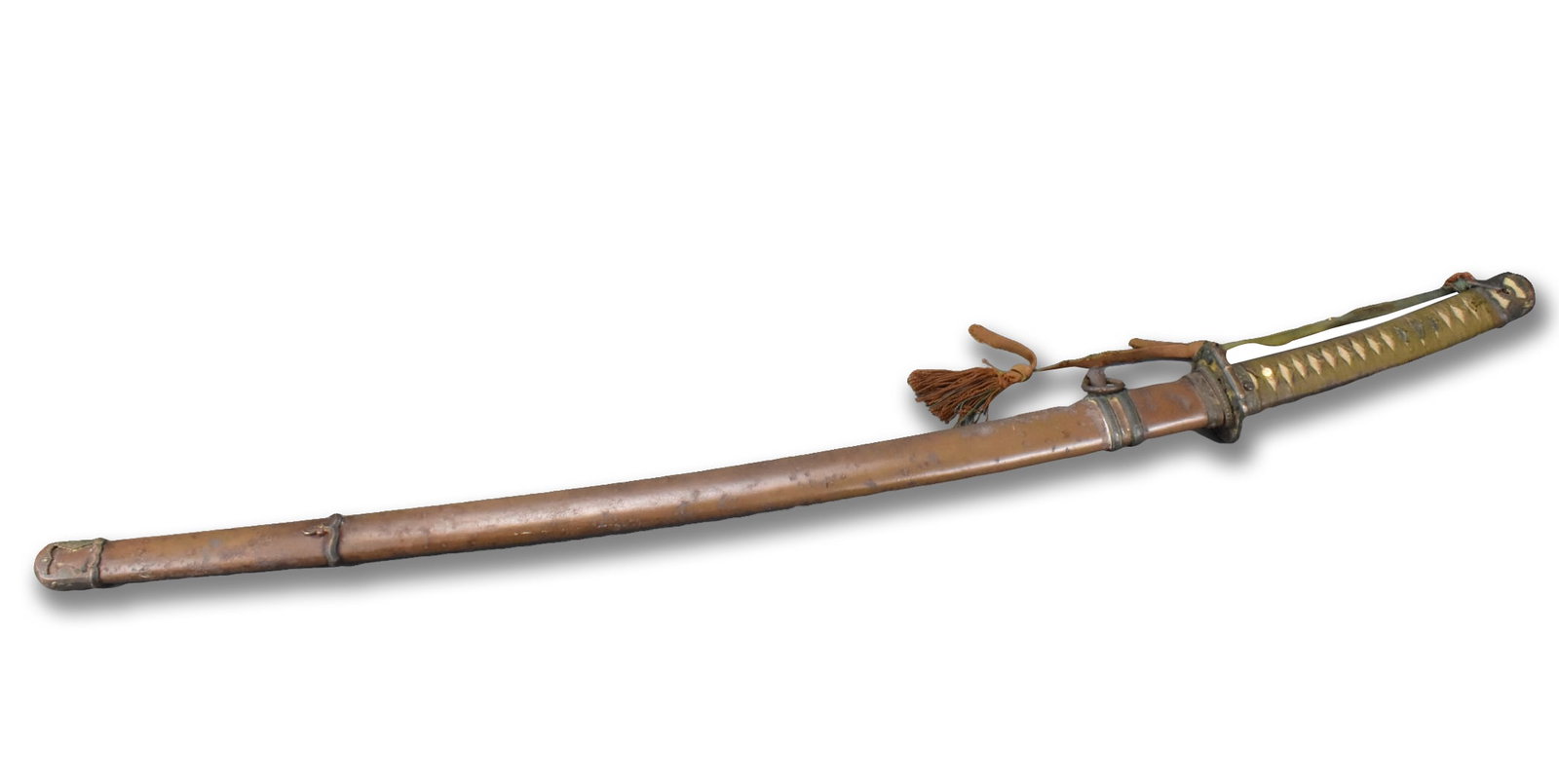 Japanese WWII Millitary Sword,Showa Period: A Japanese WWII Military sword dating from the Showa period (1926-1989). Long curved blade with curved edge tip. gilt tsuba and long tightly wrapped cord handle. Overall length: 38 3/8" (97.4 cm) Coll