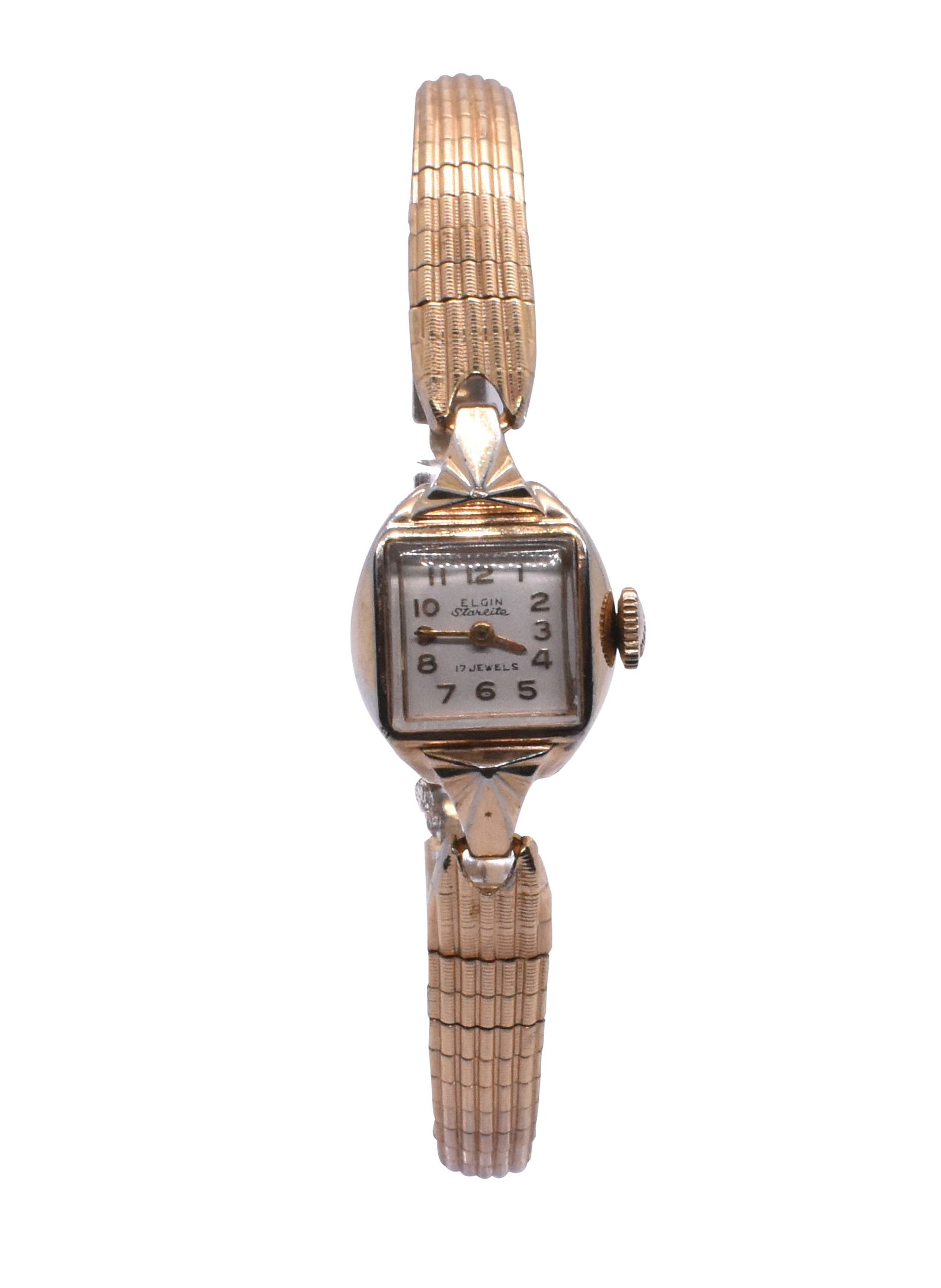 Elgin Starlite 17 Jewels Vintage Lady Watch: A vintage Elgin Starlite 17 jewels lady watch. Dainty style, square face. Base metal bezel, stainless steel back. With a link metal band. Link to HD Natural Light photos:Click here for high