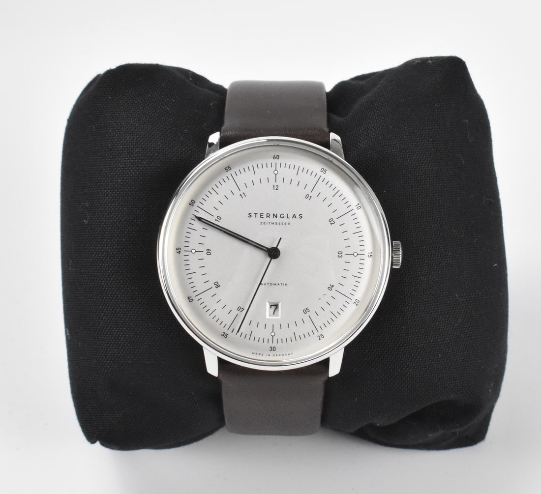 Sternglas Zeitmesser Automatik Hamburg Watch: A Sternglas Zeitmesser Automatik watch with brown strap. A Sternglas Zeitmesser Automatik Hamburg watch. Date window at the 6 pm. With papers in original box. Link to HD Natural Light photos:Click