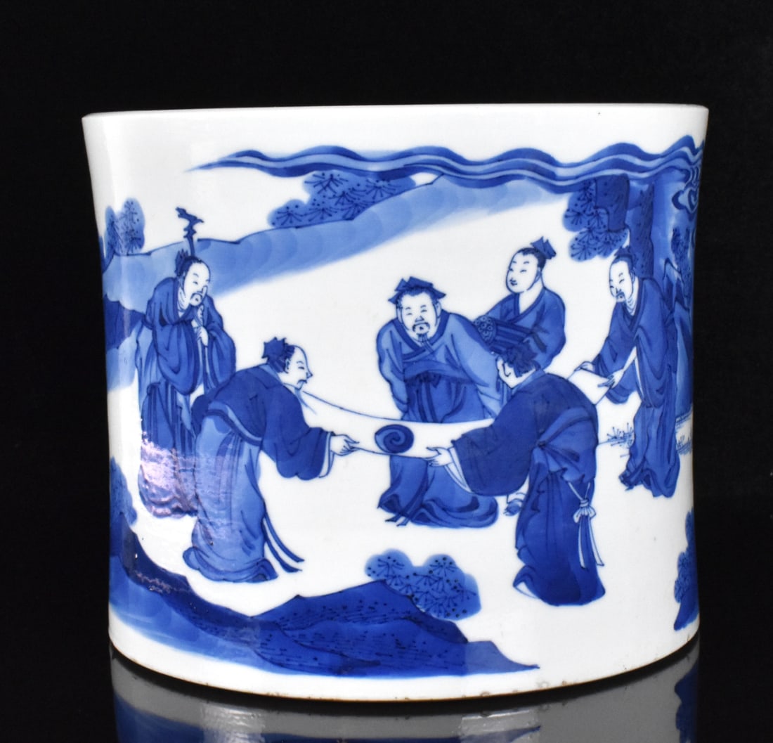 Large Chinese Blue & White Brush Pot w/ Figure: A Chinese blue and white brush pot, A large, heavily potted brush pot with blue and white design of schalor figures holding along scroll in nature.and two servant holding instrument and book next to t