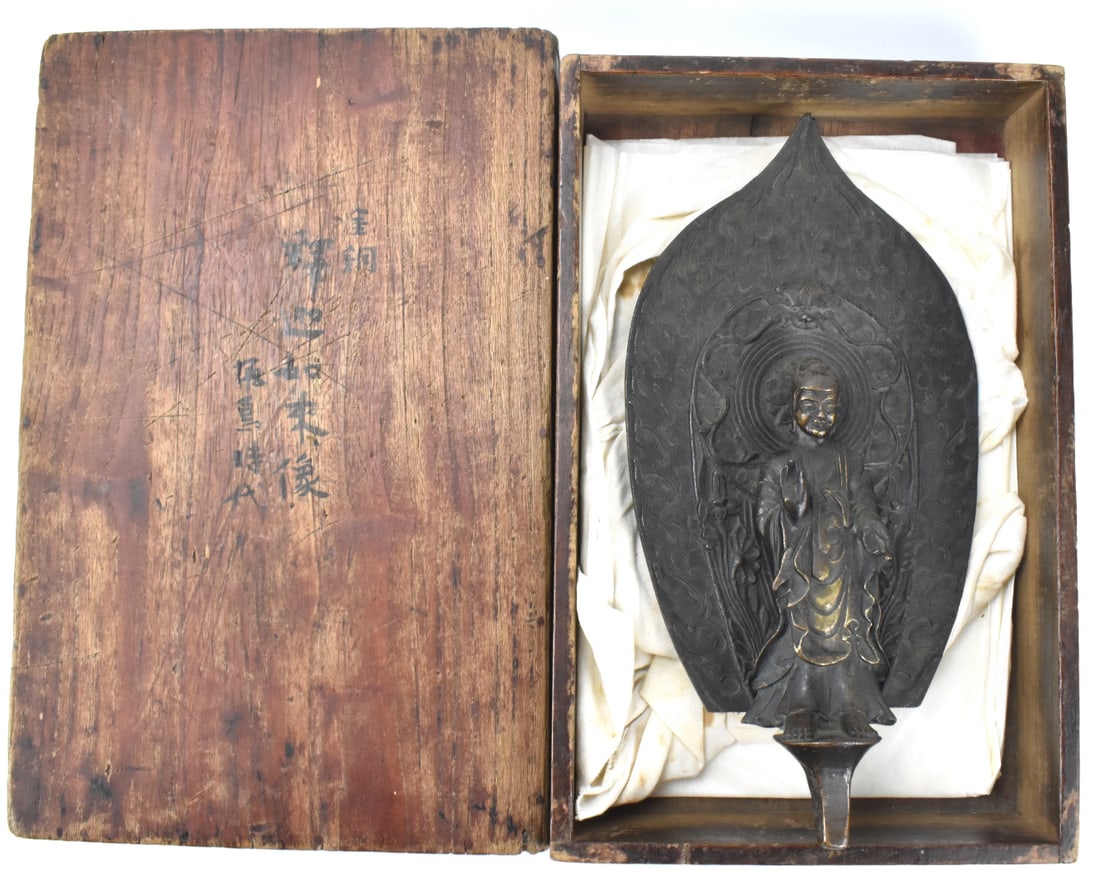 Japanese Gilt Bronze Buddha, Edo Period: A Japanese gilt bronze Buddha dating from the Edo period (1603-1868). A solid bronze standing Buddha figure with both hands in mudra positions, a slight smile on face and eyes downwards, Much detail i