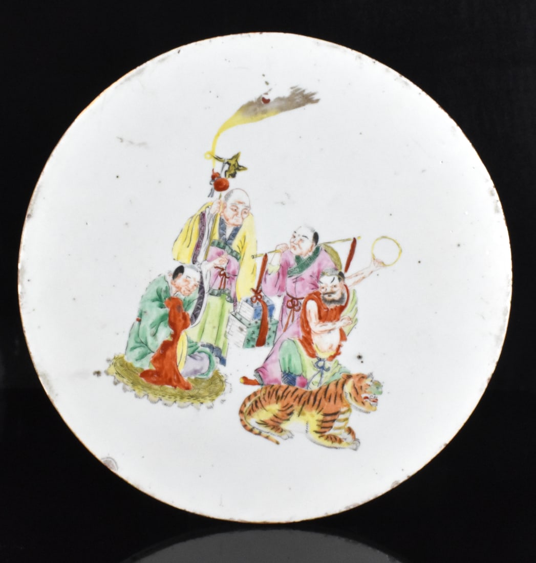 Large Chinese Famille Rose"Luohan" Plaque,19th C.: A large Chinese famille rose "Luohan" plaque. The circular plaque features a colorful scene with the Luohan in bright yellow robes holding a staff with a peach, as three figures surround him. A colorf