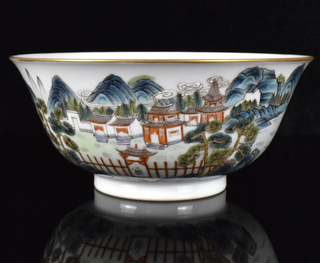 Chinese Famille Rose Bowl w/ Landscape, 19th C.: A Chinese famille rose bowl with landscape, dating from the 19th century. A gate leads into a group of small Chinese houses lined up, with trees in foreground and mountains in distance. Nine lines of