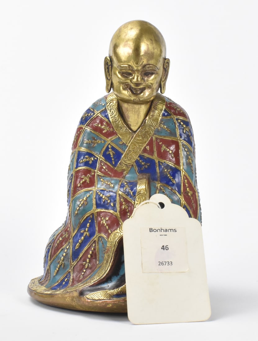 Champleve & Gilt Copper Repousse Luohan,Qing Dynas: Chinese champleve & gilt copper repousse Luohan, dated from 19th C, the figure wearing a diamond patchwork robe enameled in rust red,blue and turquoise patches each centered with pendant jewels and bo