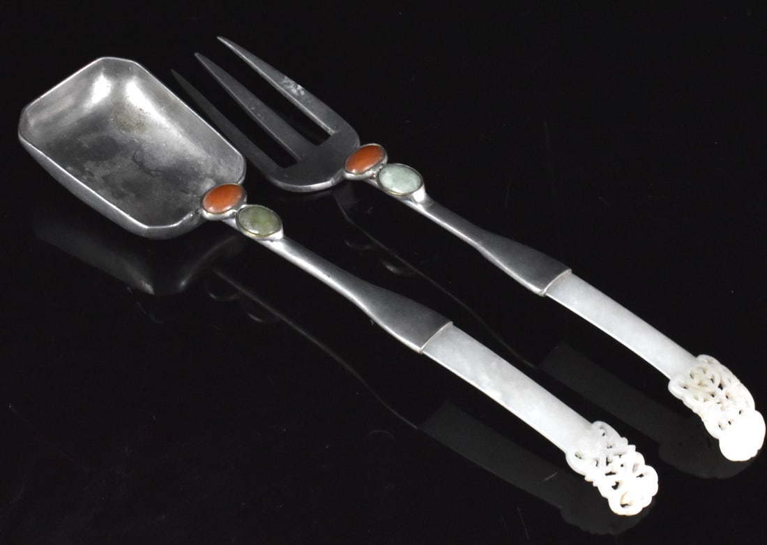 2 Chinese Pewter Fork & Spoon w/ Jade Handle: Two Chinese cutlery items; a pewter fork and spoon, each with jade handle. dated from Qing Dynasty, Each handle has inlaid jade and agate. Each handle has a piece of jade hairpin terminating with scro