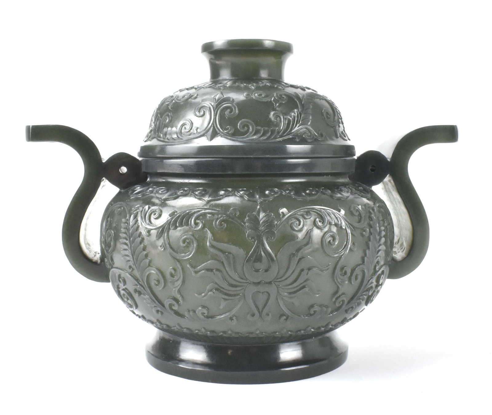 Chinese Spinach Jade Carved Covered Censer: A Chinese spinach jade carved covered censer. in archaic Ding shape with two large flat curving handles, carved Ruyi design below the straight rim and scrolling lotus flowers throughout body and cover