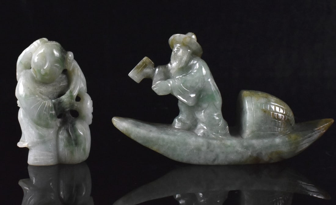 2 Chinese Jadeite Carved Fish Boat & Boy,19th C.: Two jadeite carved items; a fisherman on boat and a boy with lotus, dating from the 19th century. the fisherman stands on his narrow boat with his sun hat and the boy stands with a curving lotus behin