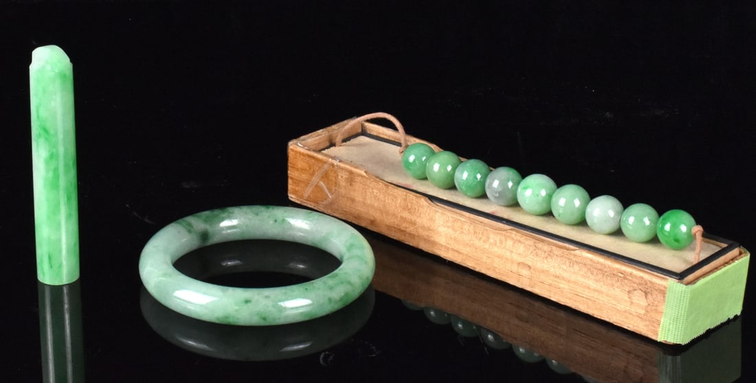 3 Chinese Jadeite Carved Tube,Bangle& Beads,Qing D: 3 Chinese jadeite carved item: a tube, a bangle and a beads ,all dated from Qing Dynasty, smoothly carved bangle with rounded edge, the tube has a bridge shaped top with a tiny drilled hole , 9 beads 