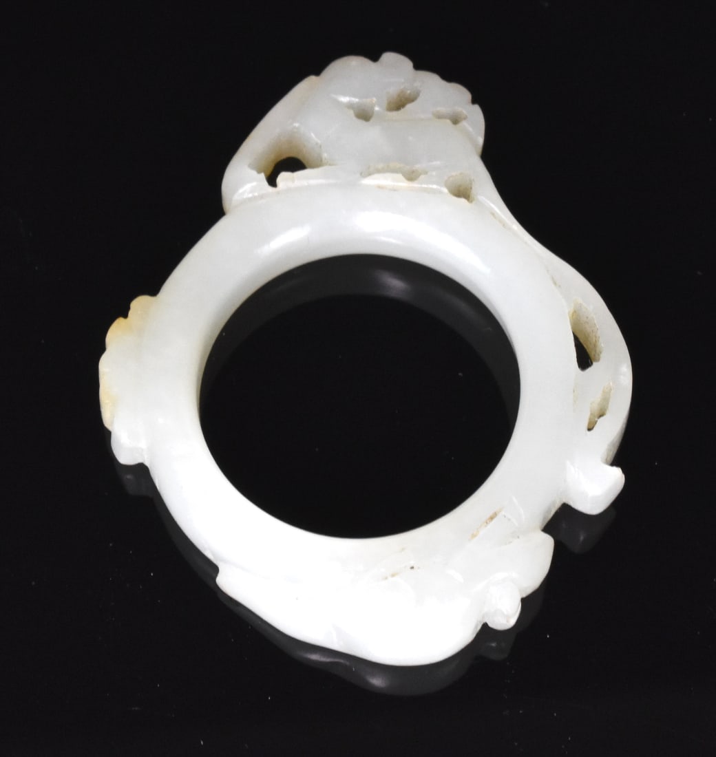 Chinese White Jade Carved Ring, 19th C.: Chinese white jade carved ring ,dated from 19th C. with a kirin beast carved on top and a mouse on bottom H: 2"(5 cm) Collection of a private Philadelphia,PA collector Link to HD Natural Light photos: