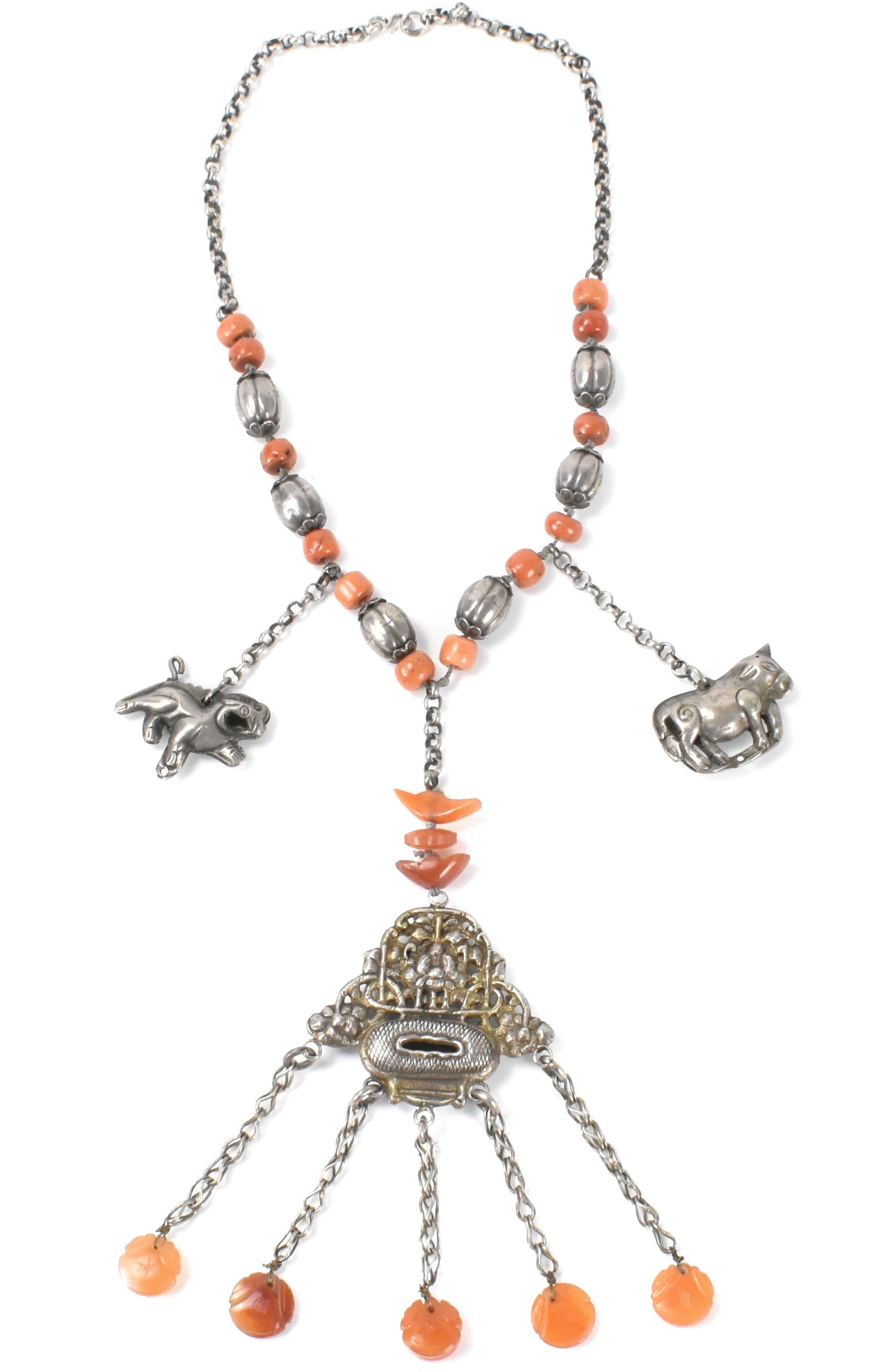 Tibetan Silver Necklace w/ Coral & Agate, 19th C.: A Tibetan silver necklace with coral and agate, dating from the Qing dynasty. Southern Red agate gemstone adorns under the flower basket necklace with coral beads divided in the chain A silver foo dog