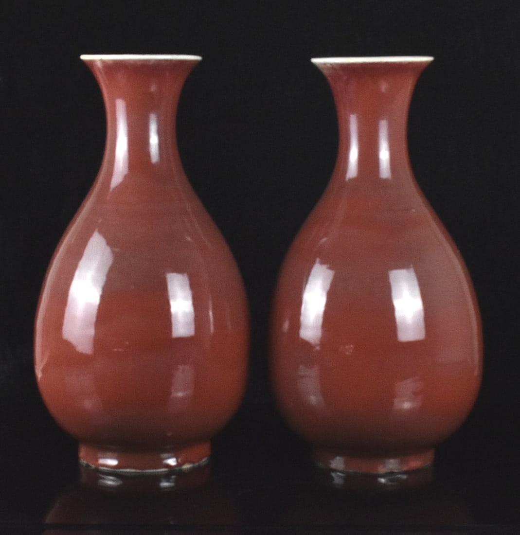 Pair Large Chinese Copper Red Glazed Vase,19th C.: A pair of large Chinese copper red glazed Yuhuchun vases, dating from the 19th century. Two tall Yuhuchun style vases with rounded body tapering to a narrow neck and flared mouth, covered with glossy 
