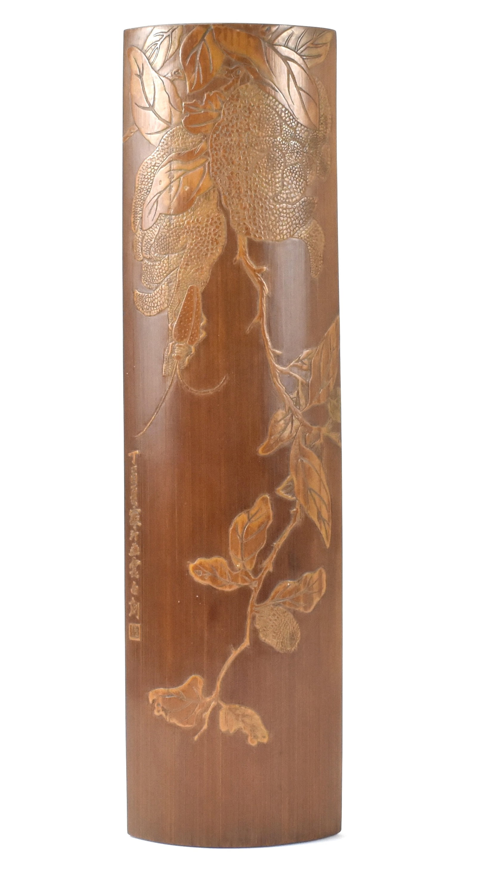 Chinese Bamboo Carved Wrist Rest, ROC Period: A Chinese bamboo carved wrist rest, dating from the Qing dynasty. The curved bamboo rest has precisely carved leaves with Buddha Hand fruit and branches, with an insect, and a crisp line of Chinese ch