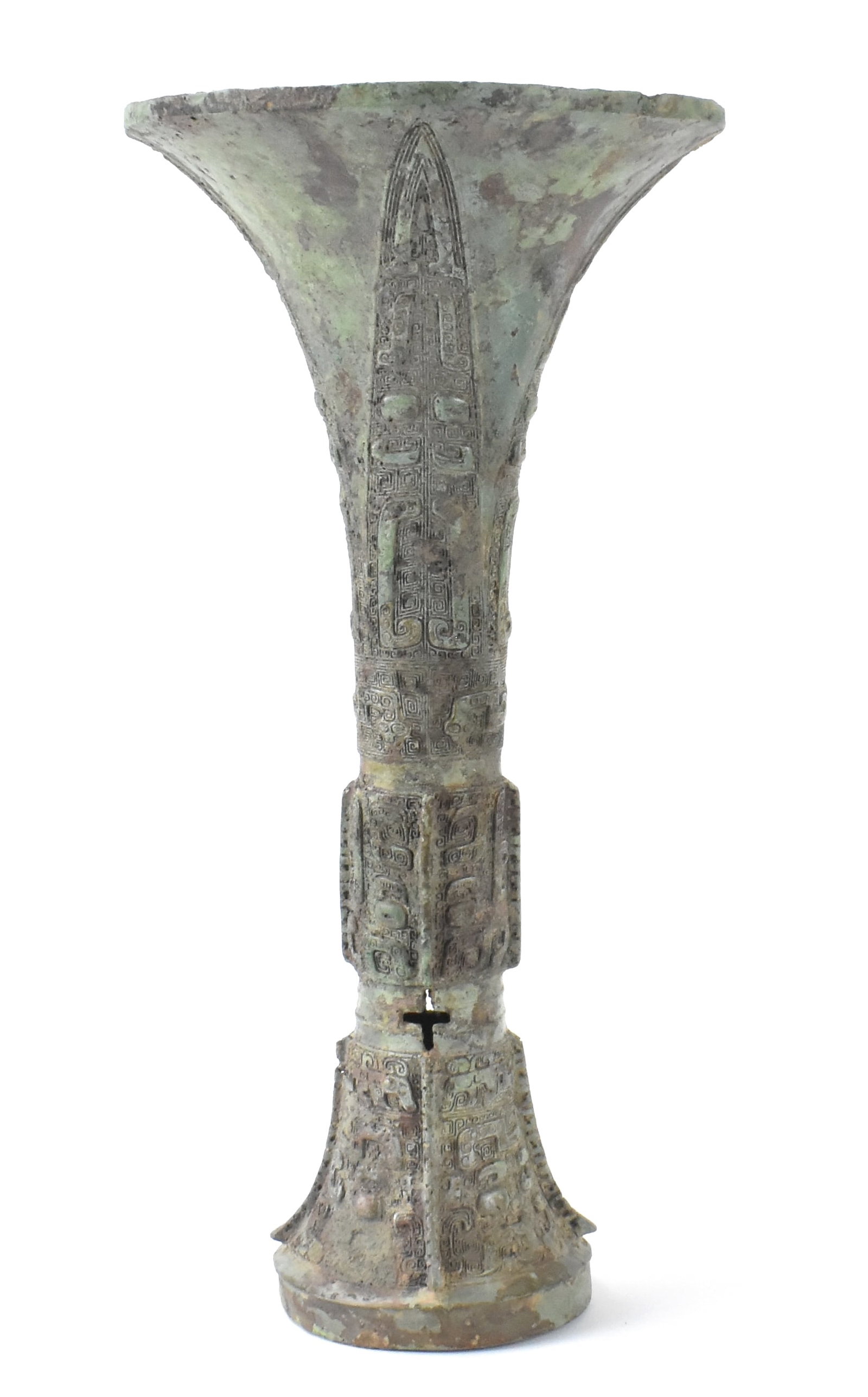Chinese Inscribed Bronze Vessel(Gu), Shang Dynasty: A Chinese archaic bronze ritual vessel (Gu), dating from the Shang dynasty (1600-1045 BC). with a trumpet rim over the slender neck, decorated with four elongated glades crisply cast Taotie motif in r