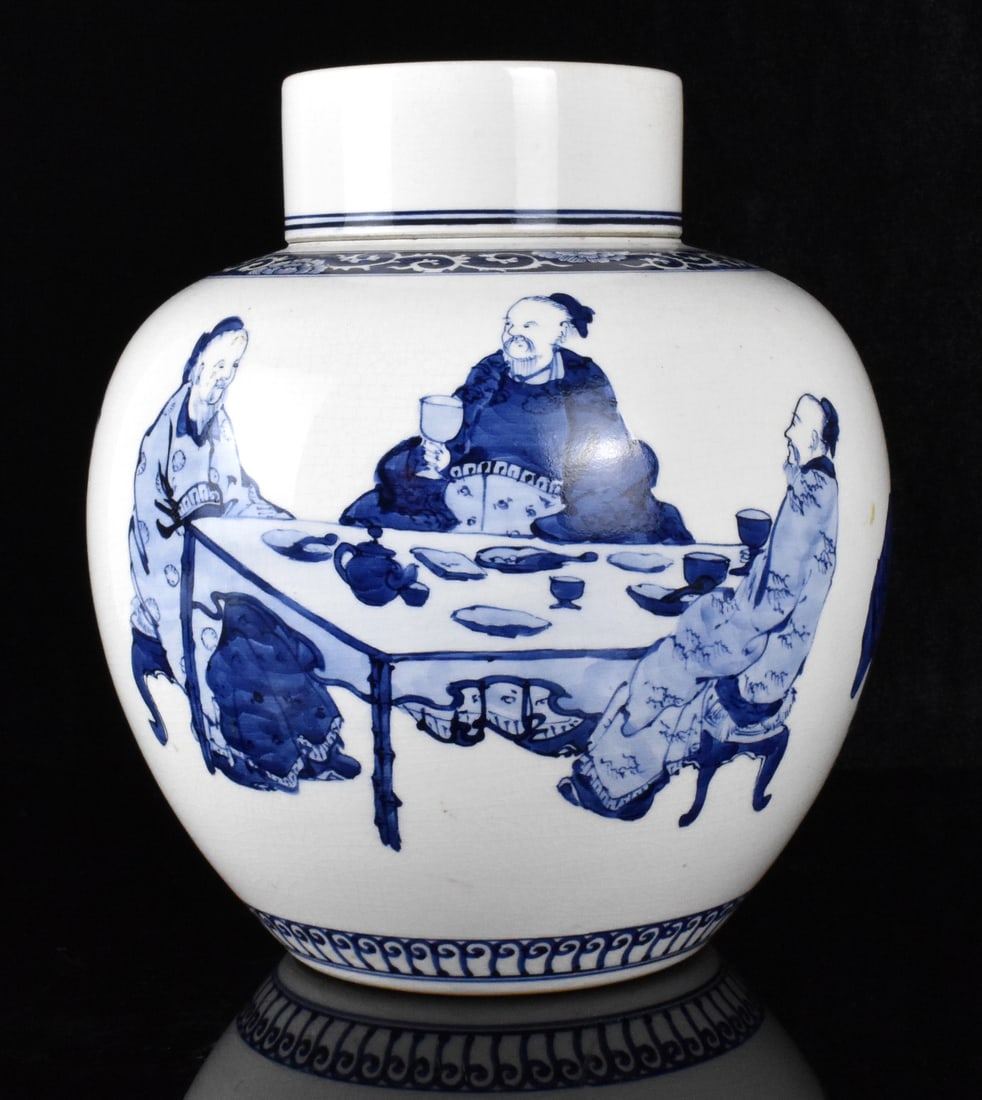 Japanese Blue & White Covered Jar, Meiji Period: A Japanese blue and white covered jar, dating from the Meiji period (1868-1912). rounded jar expands from the wide base to the shoulder tapering to the short straight neck. design depicts a group of s