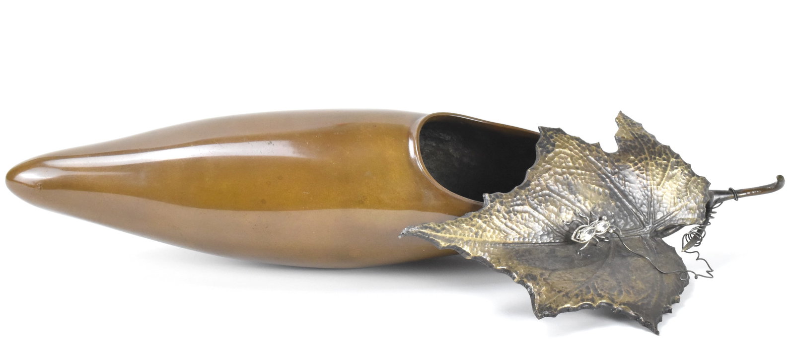 Japanese Bronze Cast Eggplant w/ SIlver Leaf: A Japanese bronze cast eggplant with silver leaf. The long tapered eggplant ,the detailed silver leave with exposed veins has a silver insect crawling on it. with an oval cut out for use as a censer. 