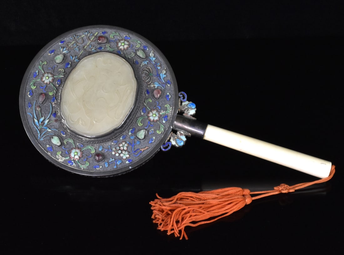 Chinese Cloisonne Mirror w/ Jade Plaque Inlay,Qing: A Chinese cloisonne mirror with jade plaque inlaid, dating from the Qing dynasty. Back of mirror features a large oval carved jade plaque of twin fish with whiskers, set into cloisonne ground with rai