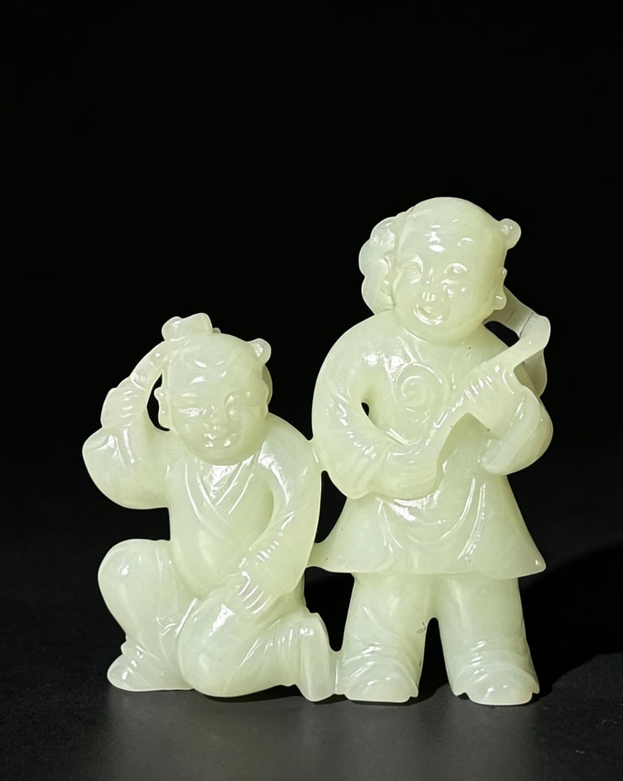 Chinese White Jade Carved Boys, 19th C.: A Chinese white jade carving of group of boys.dated from 19th C. Two boys stand side by side, with one kneeling, on left. holding lotus flower and lingzhi mushroom H. 2 1/4" (5.7 cm) Collection of a p