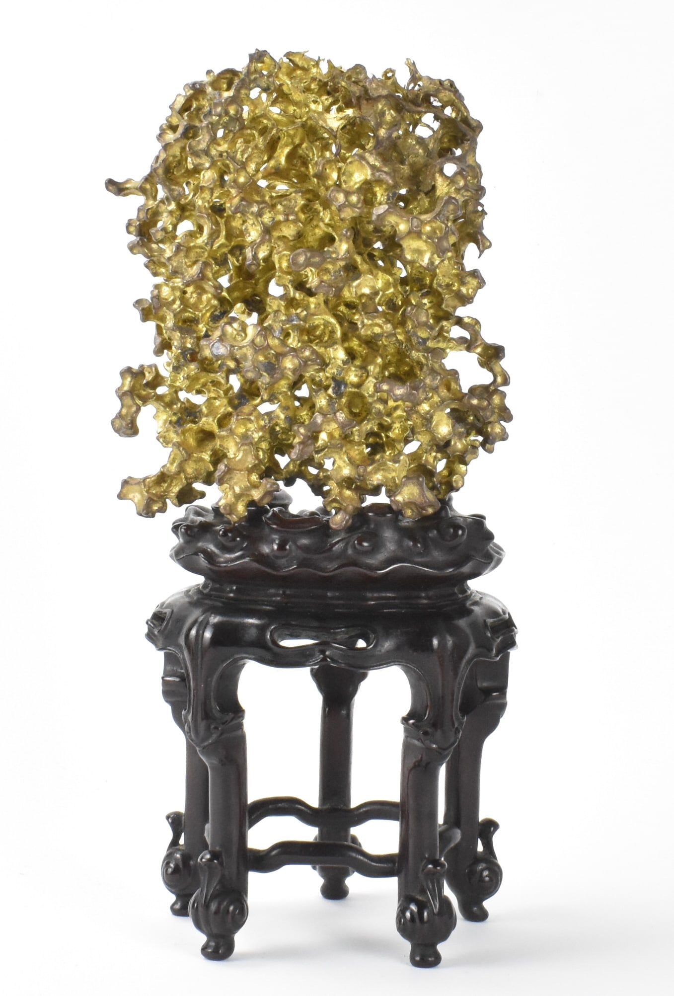 Chinese Gilt Bronze Scholar Rock on Stand, Qing D.: A Chinese gilt bronze scholar rock on wooden stand. dated from Qing Dynasty,The rock form made from bronze and gilded has numerous details to contemplate. Perched on a five legged wooden stand with lo