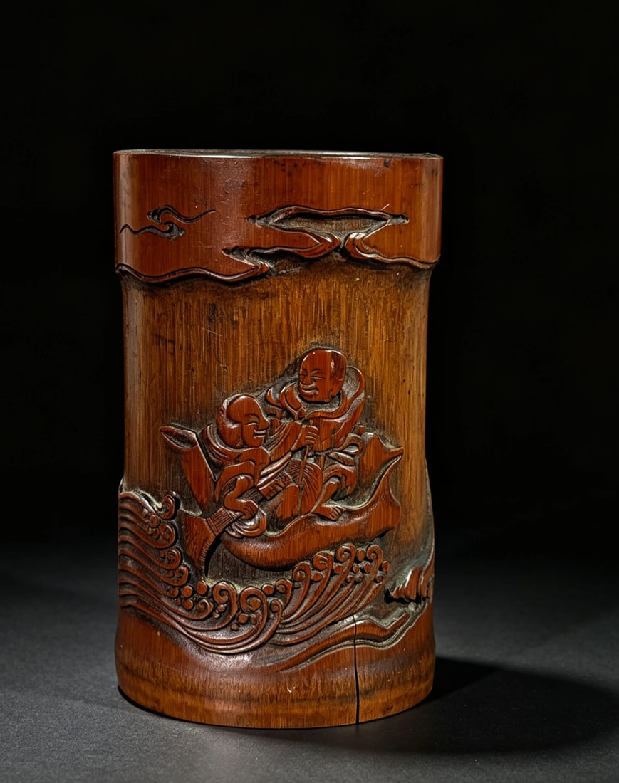 Chinese Bamboo Carved Brushpot w/ Hehe,19th C.: A Chinese bamboo carved brushpot with Hehe immortals. Two smiling immortals in a boat with paddle over waves and under the sky. H. 4.8" (12.2 cm) Collection of a private Dallas, Taxes collector Link t