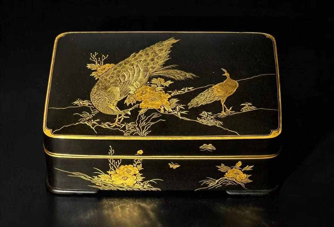 Japanese Signed Komai Covered Box w/ Peacock,Meiji: A Japanese signed Komai covered box. dated from Meiji Period , Box featuring intricate damascene gold and silver inlay of peacock in nature on the cover, more floral and butterfly design on sides, mad
