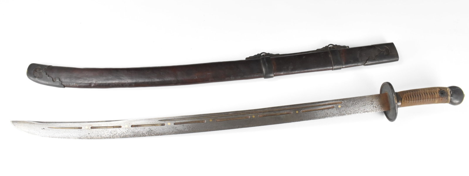 Chinese Sword (Dao), Qing Dynasty: A Chinese sword (Dao) dating from the Qing dynasty. A slightly curved, hick powerful sword used for slashing and chopping. A rounded hand guard with rim, and simple rounded pommel. Hole in handle for 