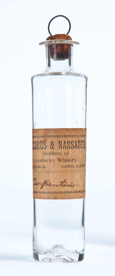 EARLY KENTUCKY TURPENTINE BOTTLE: 19th century, colorless, blown glass bottle with pontil mark, original cork, and original label "LAZARUS & NASSAUER Distillers of Kentucky Whiskey Office 713 Ohio St. CAIRO, ILLINOIS" and handwritten 