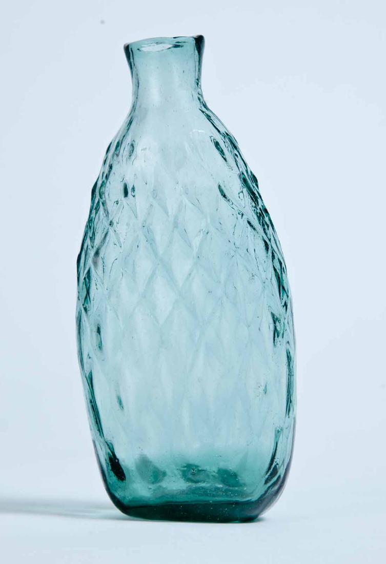 PATTERN-MOLDED POCKET FLASK: Midwestern, 1820-1840, aqua in color, 14 diamond/honeycomb, with flattened sides, sheared lip, and pontil mark. 6" high.