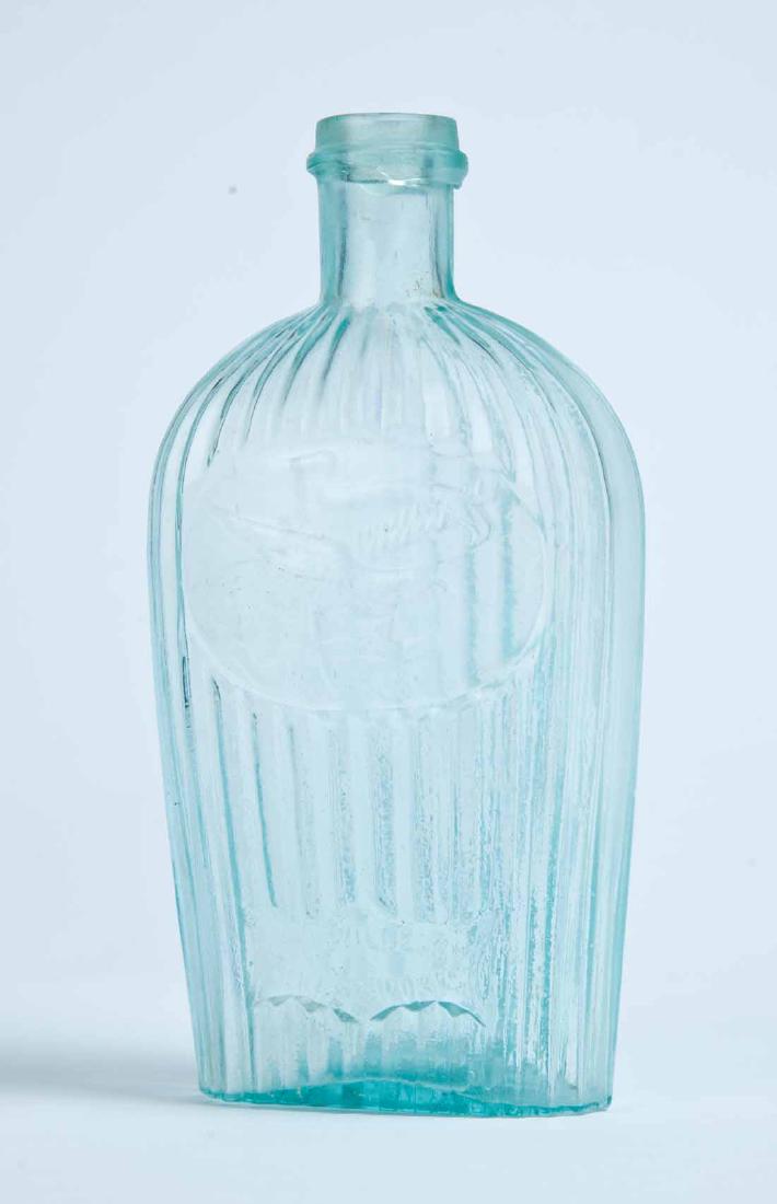 LOUISVILLE EAGLE FLASK: GII-36, Louisville Glass Works, Louisville, KY, mid-19th century, pint, aqua in color, with a ribbed body, and a flying eagle over "LOUISVILLE KY GLASS WORKS" on the obverse. 7.75" high.