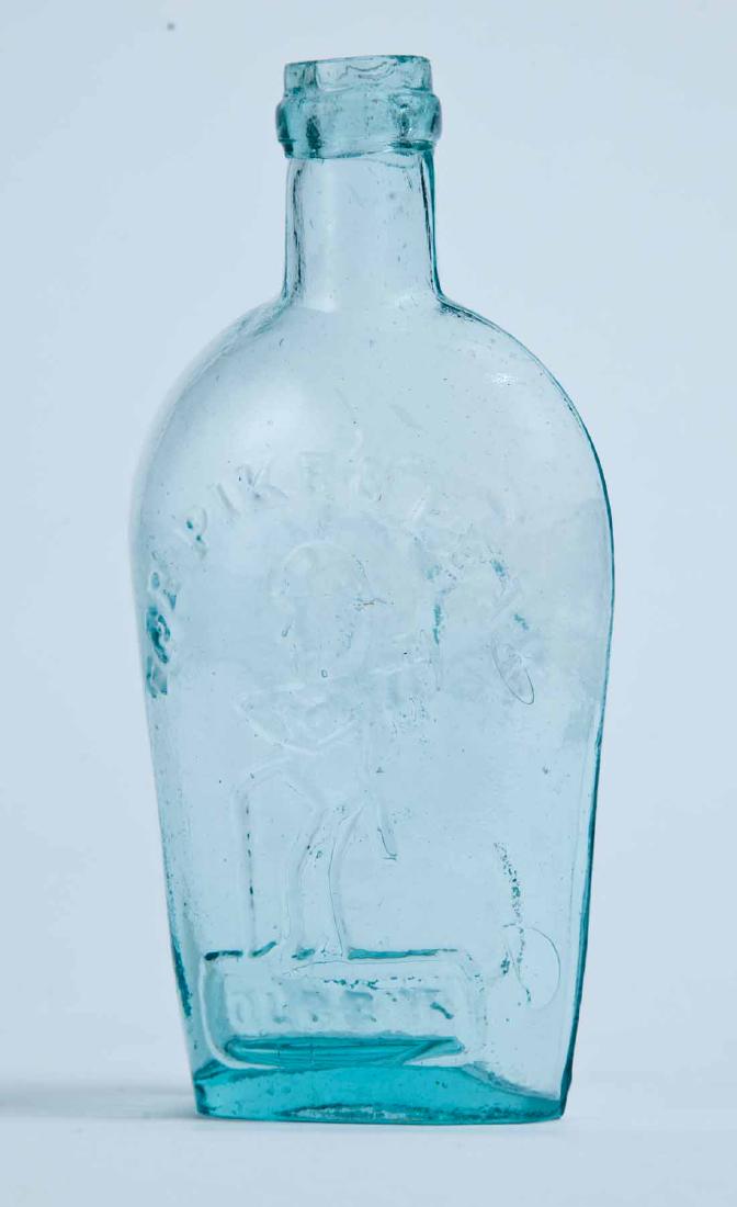 PITTSBURGH "FOR PIKE'S PEAK" FLASK: GXI-10, Pittsburgh, PA, mid-19th century, half pint, aqua in color, with prospector, "FOR PIKE'S PEAK," and "OLD RYE" on the obverse, and an eagle over "PITTSBURGH PA" on the reverse, with a ringed li