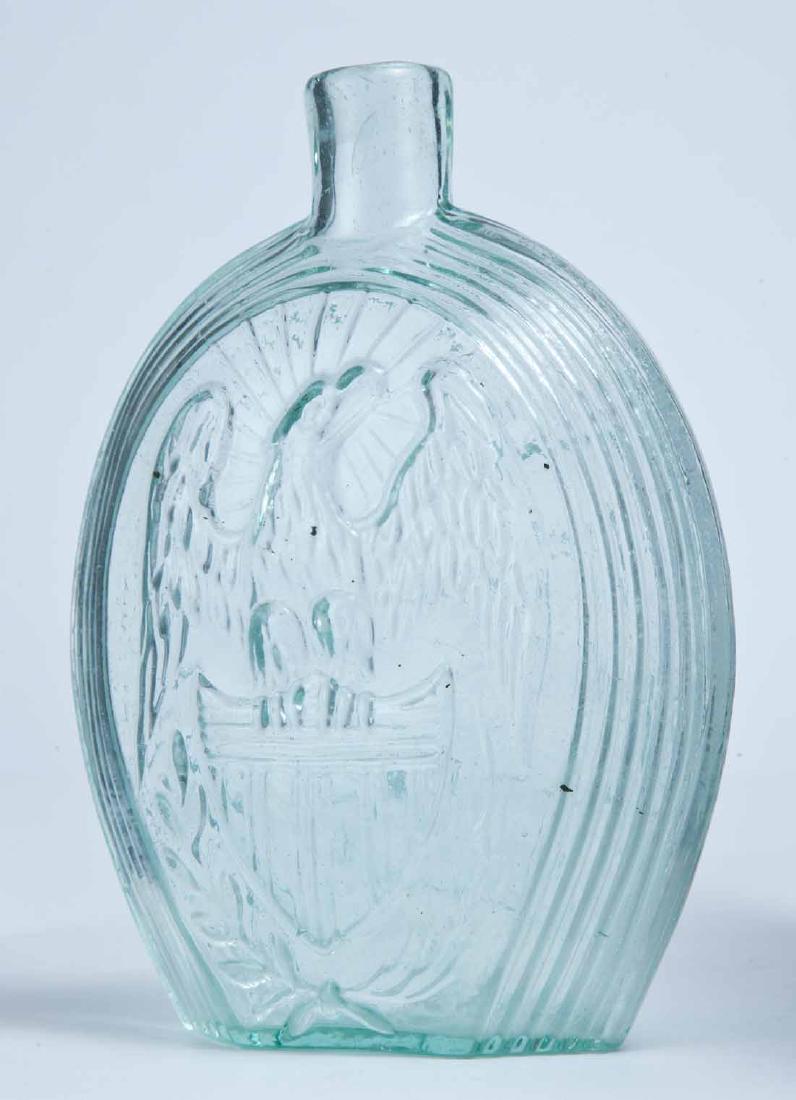EAGLE & "FOR OUR COUNTRY" FLASK: GII-53, attributed to Coffin and Hay, Hammonton, NJ, mid-19th century, pint, aqua in color, with a rayed eagle and shield on the obverse and a flag and "FOR OUR COUNTRY" on the reverse, and a plain li
