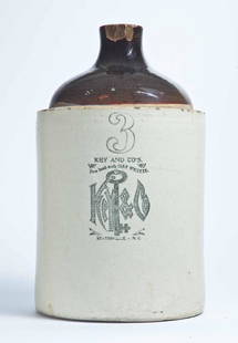 STATESVILLE, NORTH CAROLINA ADVERTISING STONEWARE: 3-gallon jug with bicolor glaze and stamped advertisement "KEY AND CO'S [__] hand-made CORN WHISKEY STATESVILLE, N.C." 16" high.