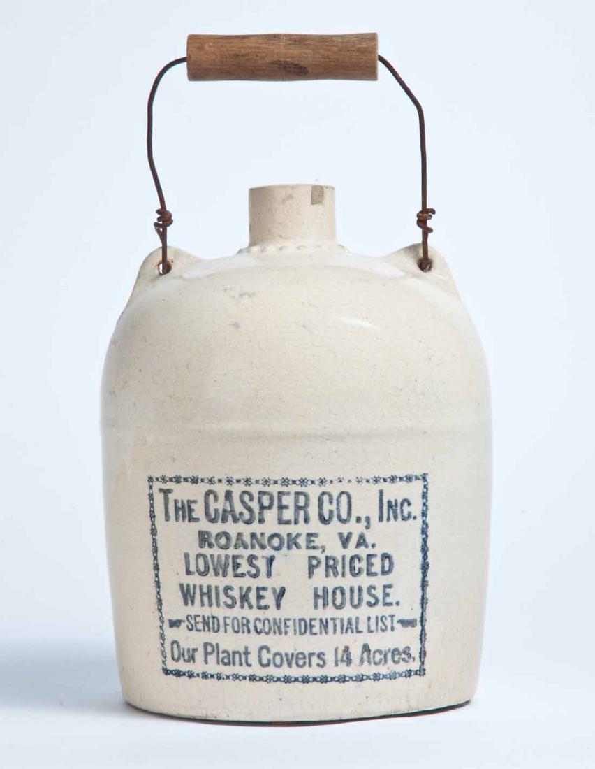 ROANOKE, VIRGINIA ADVERTISING STONEWARE WHISKEY JUG: 1-gallon jug with bale handle and stamped advertisement "THE CASPER CO., INC. ROANOKE, VA. LOWEST PRICED WHISKEY HOUSE SEND FOR CONFIDENTIAL LIST OUR PLAN COVERS 14 ACRES." 9.5" high.