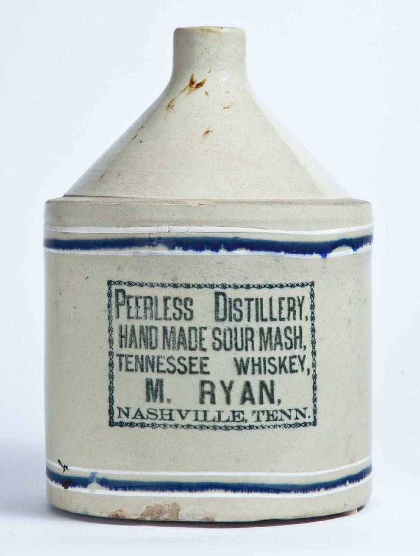 NASHVILLE, TENNESSEE ADVERTISING STONEWARE WHISKEY JUG: 2-gallon jug with cobalt and white striping and stamped advertisement "PEERLESS DISTILLERY, HAND MADE SOUR MASH TENNESSEE WHISKEY, M. RYAN, NASHVILLE, TENN." 13" high.