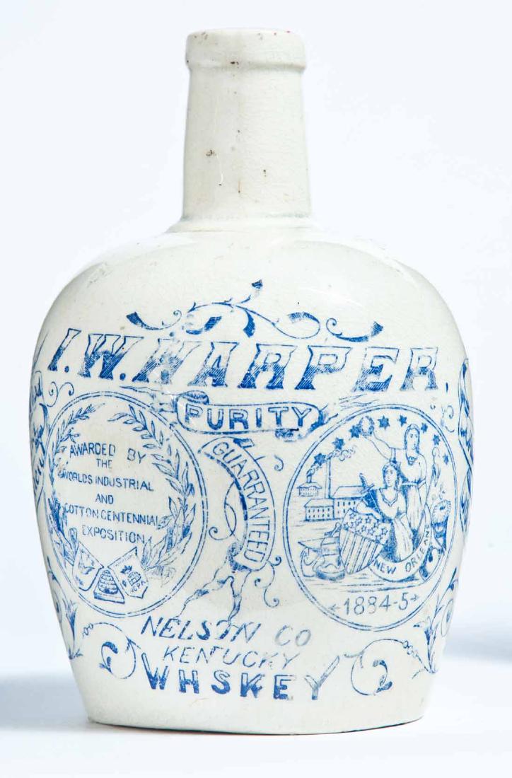 NELSON COUNTY, KENTUCKY ADVERTISING STONEWARE WHISKEY: Small size with elaborate stamped advertisement for I.W. Napper, Nelson County, Kentucky, and "AWARDED BY THE WORLDS INDUSTRIAL AND COTTON CENTENNIAL EXPOSITION NEW ORLEANS 1885-5." 7" high.