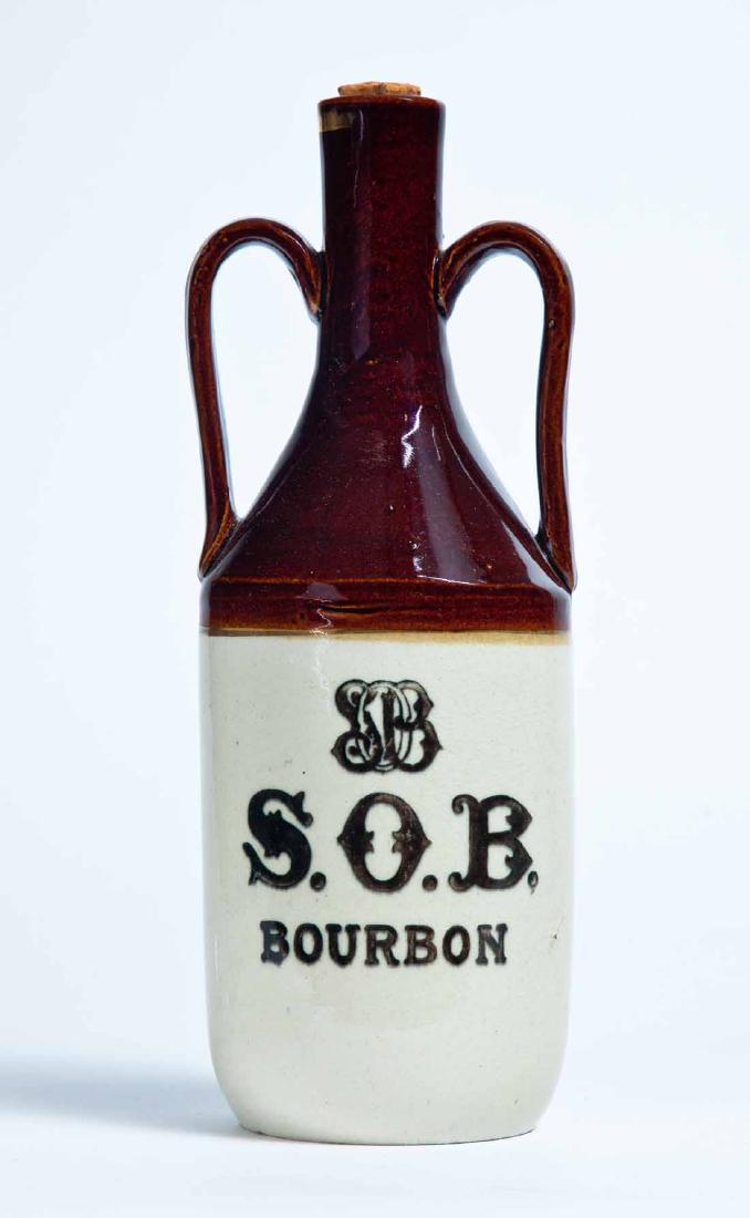 PEORIA, ILLINOIS ADVERTISING STONEWARE BOURBON BOTTLE: 1-quart bottle with a bicolor glaze and stamped advertisement "S.O.B BOURBON" and "SCHNEBLY-O'MEARA CO. PEORIA, ILL." 11" high.