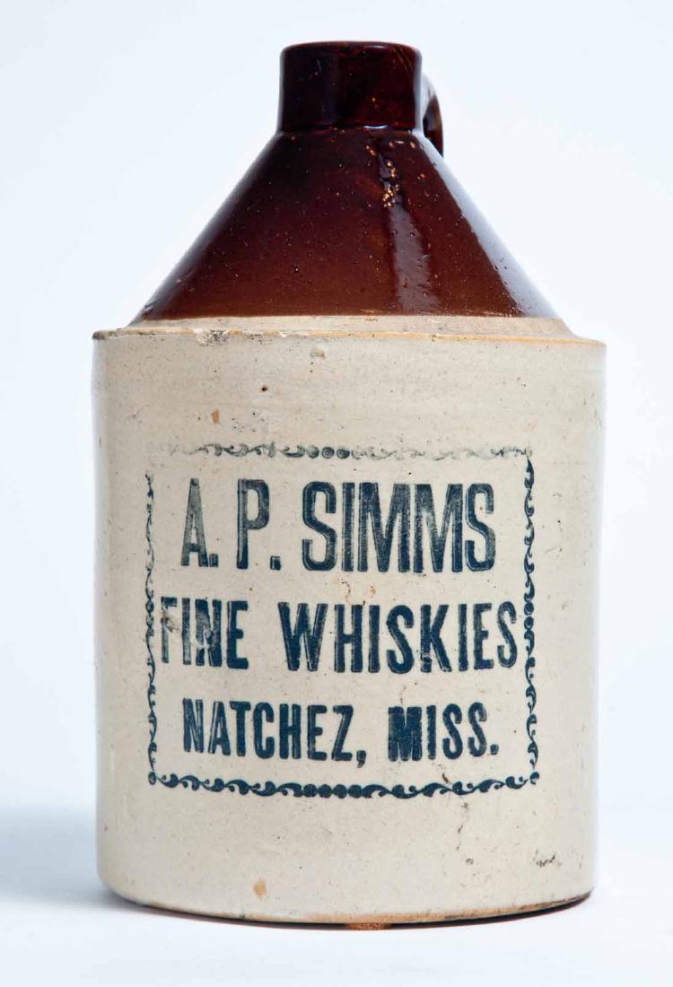 NATCHEZ, MISSISSIPPI ADVERTISING STONEWARE WHISKEY JUG: Half-gallon jug with bicolor glaze and stamped advertisement "A.P. SIMMS FINE WHISKIES NATCHEZ, MISS."